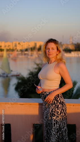 Woman tourist Luxor West Bank Nile river view Egypt travel 