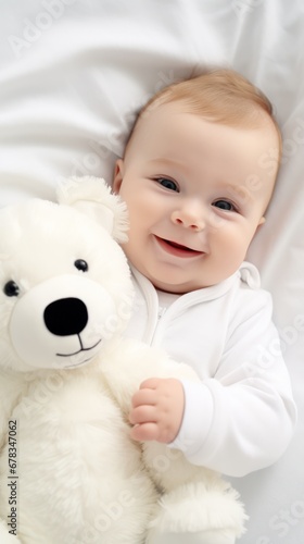  adorable baby in bed, happily hugging toy bear, perfect for conveying concept of restful sleep