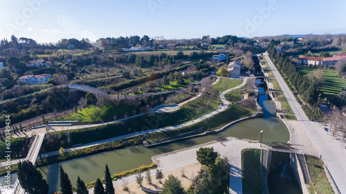 The stepped Fonseranes Locks, weaving through greenery.