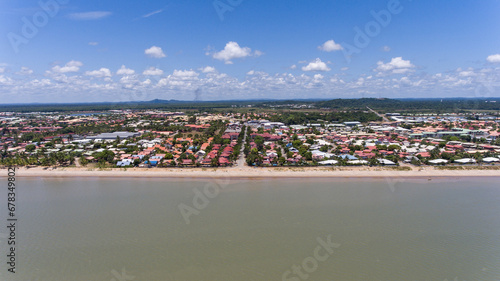 Aerial perspective of Kourou's coastal edge.