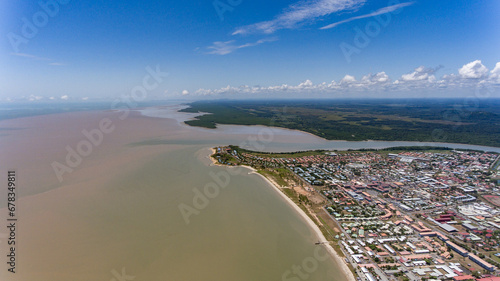 Urban grid meets natural beach in Kourou.