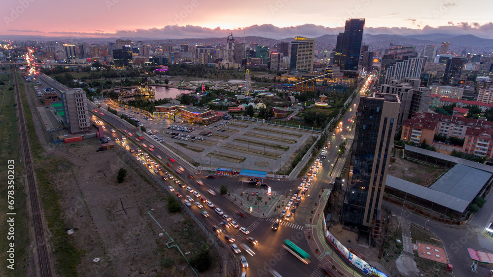 Ulaanbaatar skyline ablaze at twilight.