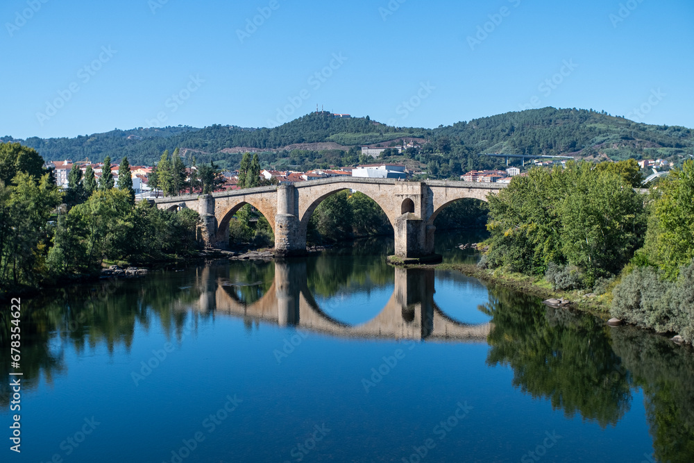 River Minho and the old roman bridge of Ourense. Galicia, Spain