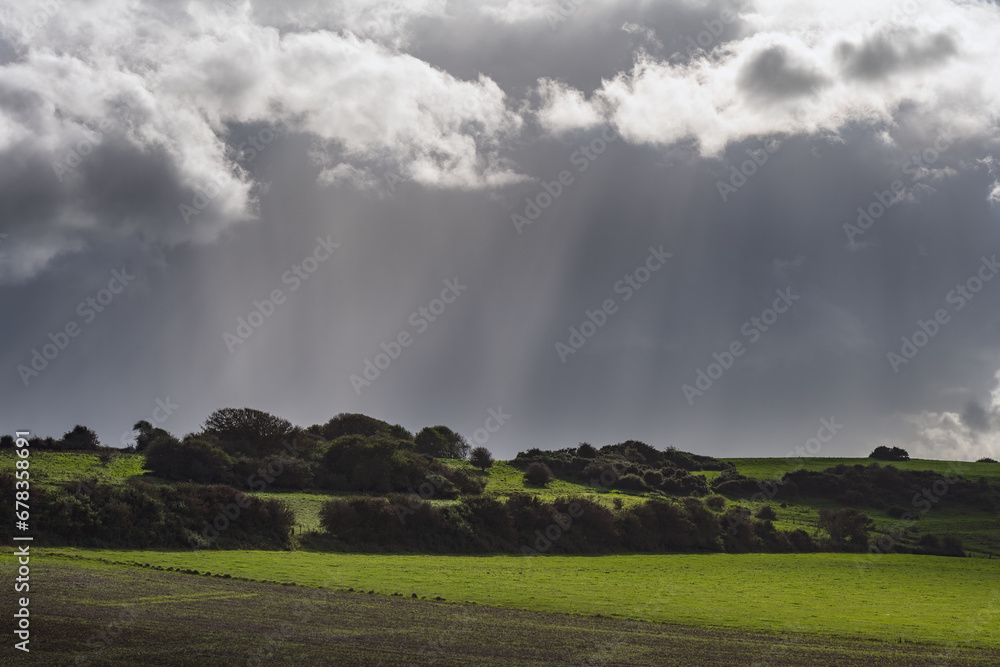 Walking on the South Downs way on an autumn cloudy day, East Sussex, England