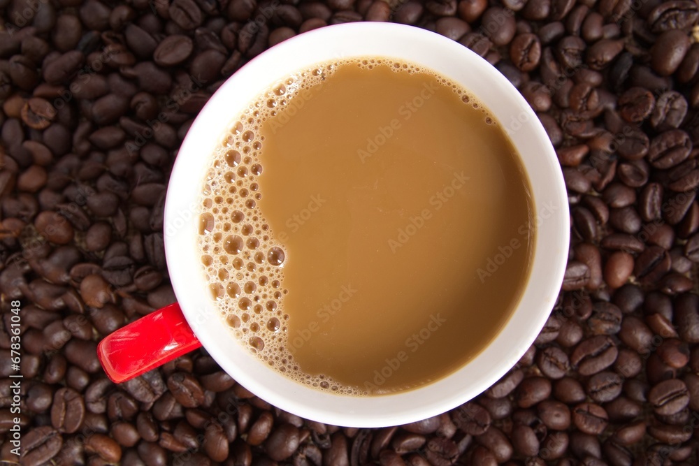 Fototapeta premium cup of coffee with beans