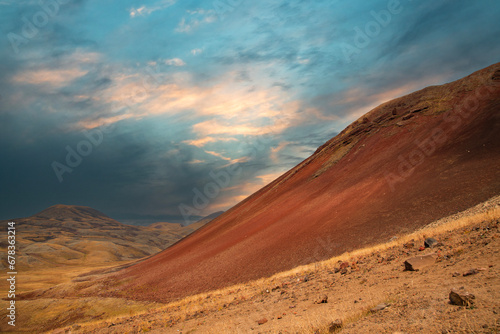 Dramatic sunset in the volcanic mountains.  © Inga Av