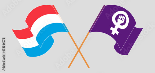 Crossed and waving flags of Luxembourg and Feminism photo