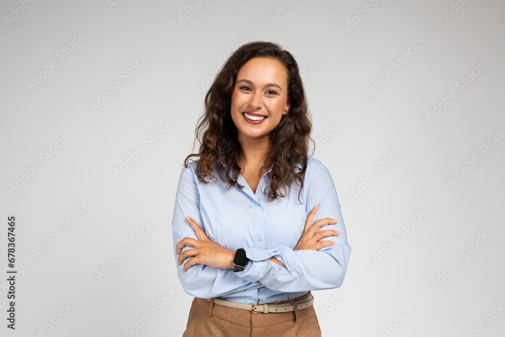 Smiling friendly confident millennial caucasian lady manager, teacher in formal wear with crossed arms - obrazy, fototapety, plakaty 