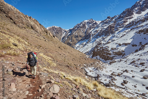 Hiking to the summit of Jebel Toubkal, mountain of Morocco.