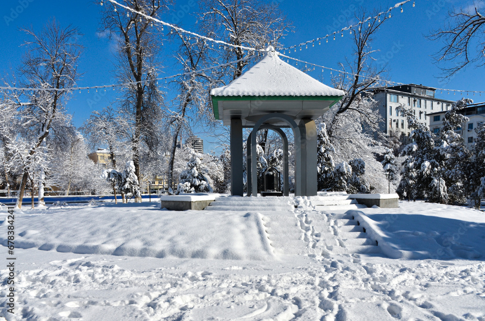 Peace Bell pavilion in Dostlik Recreational Park during winter season (Tashkent, Uzbekistan) Peace Bell pavilion in Dostlik Recreational Park during winter season (Tashkent, Uzbekistan)