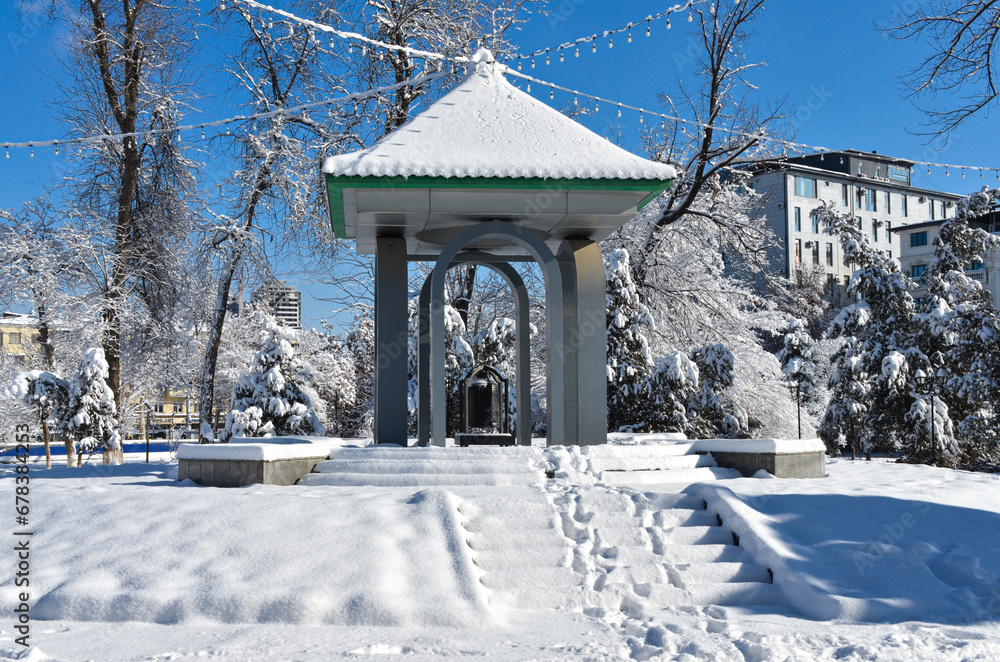 Peace Bell pavilion in Dostlik Recreational Park during winter season (Tashkent, Uzbekistan) Peace Bell pavilion in Dostlik Recreational Park during winter season (Tashkent, Uzbekistan)
