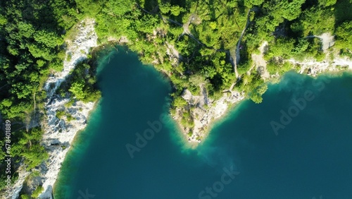 Aerial top view of the Zakrzowek reservoir with mesmerizing turquoise water photo
