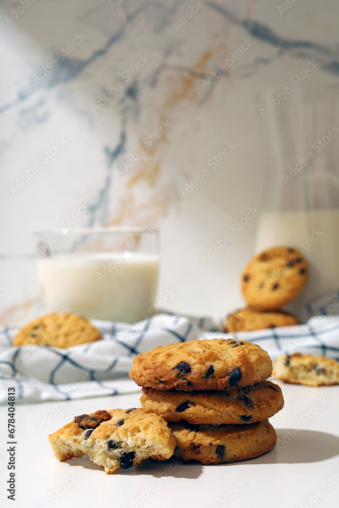 chocolate cookies and milk with kitchen table chocolate cookies and milk with kitchen table
