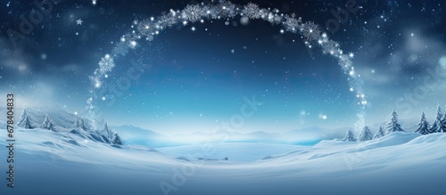 The Christmas background design features an isolated frame with a winter scene creating a space filled with snowy white and sparkling stars arranged in a circular pattern The blue circle add © TheWaterMeloonProjec