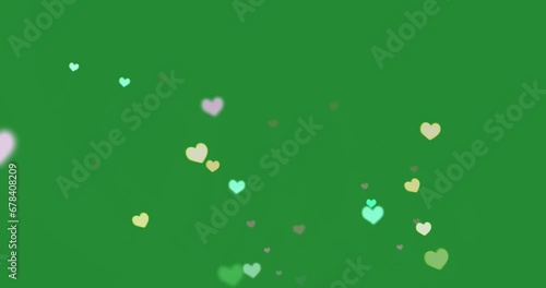 Whimsical Hearts in Motion: Green Video Background with Playful Animated Hearts! 💚🎥 #GreenBackground #AnimatedHearts #VisualWhimsy photo