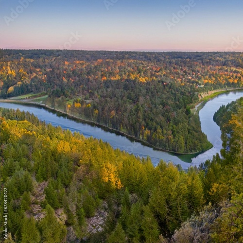 Breathtaking aerial view of a bend of a river, flowing along the evergreen forest, on a sunny day