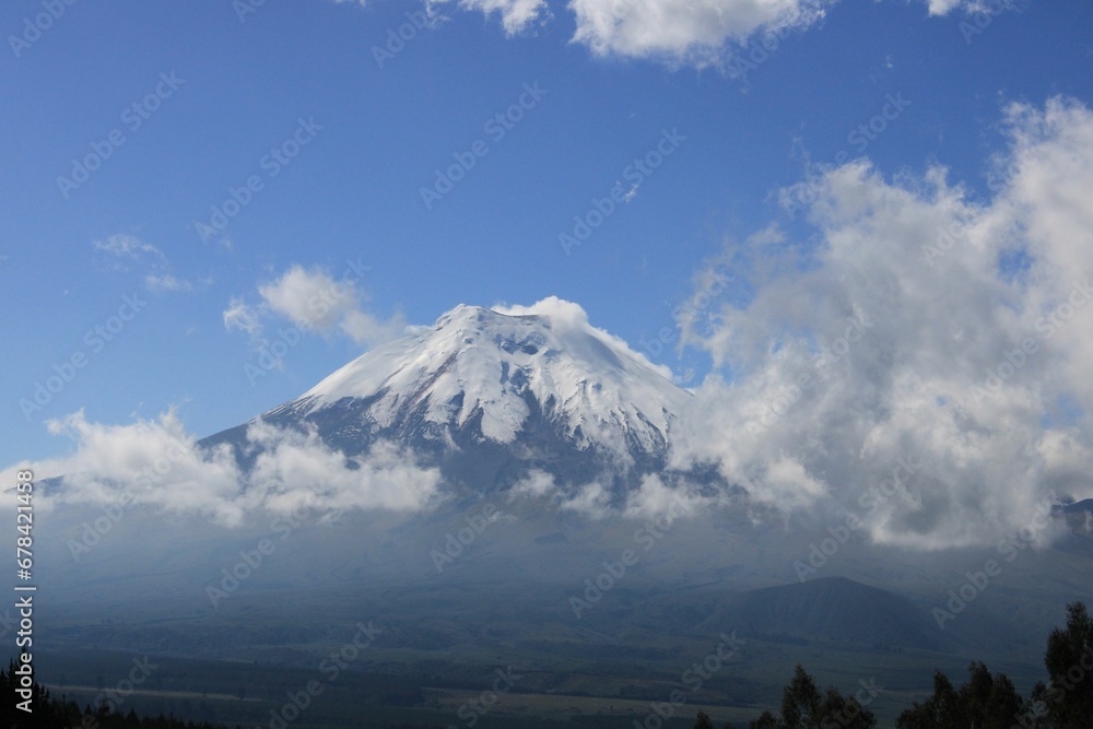 Landscape view of the snow-covered Cotopaxi Mountain in Ecuador