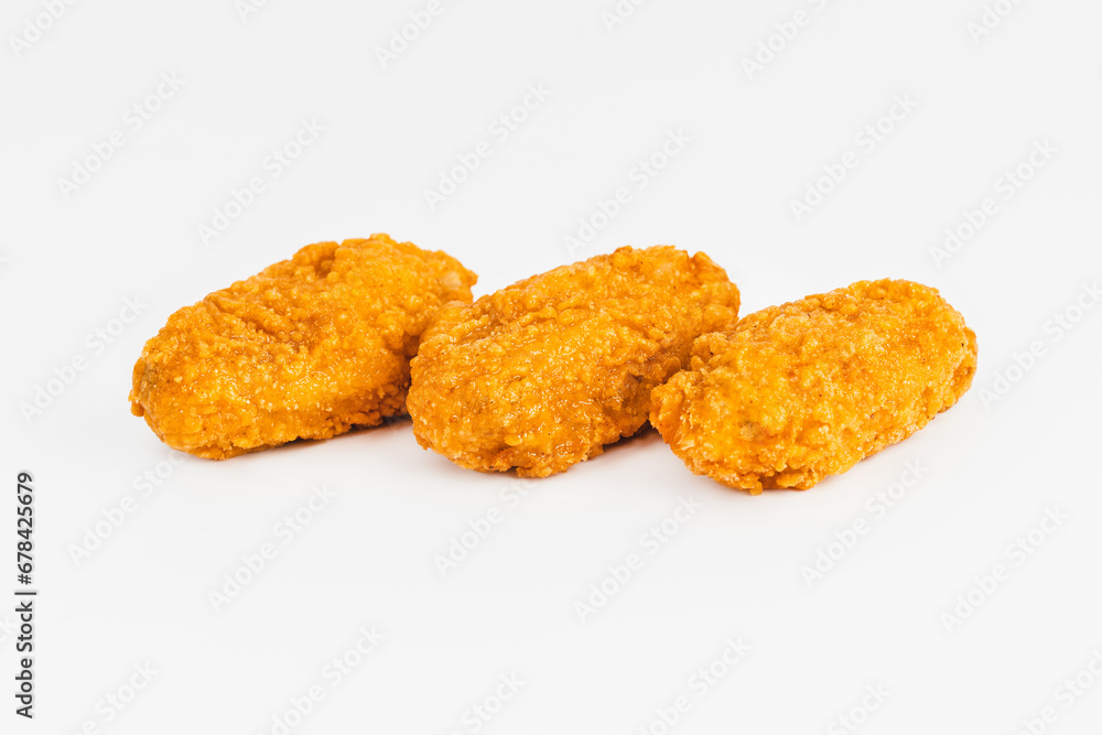 Semi-finished product, fried wings.Breaded Chicken wings with salad on a White Background,food at home.Fast homemade food.Chicken Breaded Raw Meat. Fast cooking. Semi-finished product, fried wings.Breaded Chicken wings with salad on a White Background,food at home.Fast homemade food.Chicken Breaded Raw Meat. Fast cooking.