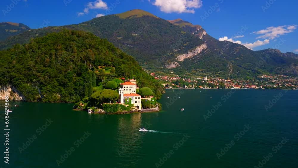 Aerial view of the luxury Villa Balbianello with terraced gardens, on the rocky wooded peninsula of Lavedo on Lake Como, panorama, picturesque residence. Green Planet. Nature. Lenno Italy 10.2023 Aerial view of the luxury Villa Balbianello with terraced gardens, on the rocky wooded peninsula of Lavedo on Lake Como, panorama, picturesque residence. Green Planet. Nature. Lenno Italy 10.2023