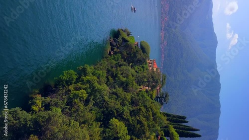 Aerial view of the luxury resort Villa Balbianello with terraced gardens, on the rocky wooded peninsula of Lavedo on Lake Como, panorama, picturesque residence. Green Planet. Nature. Lenno Italy  photo