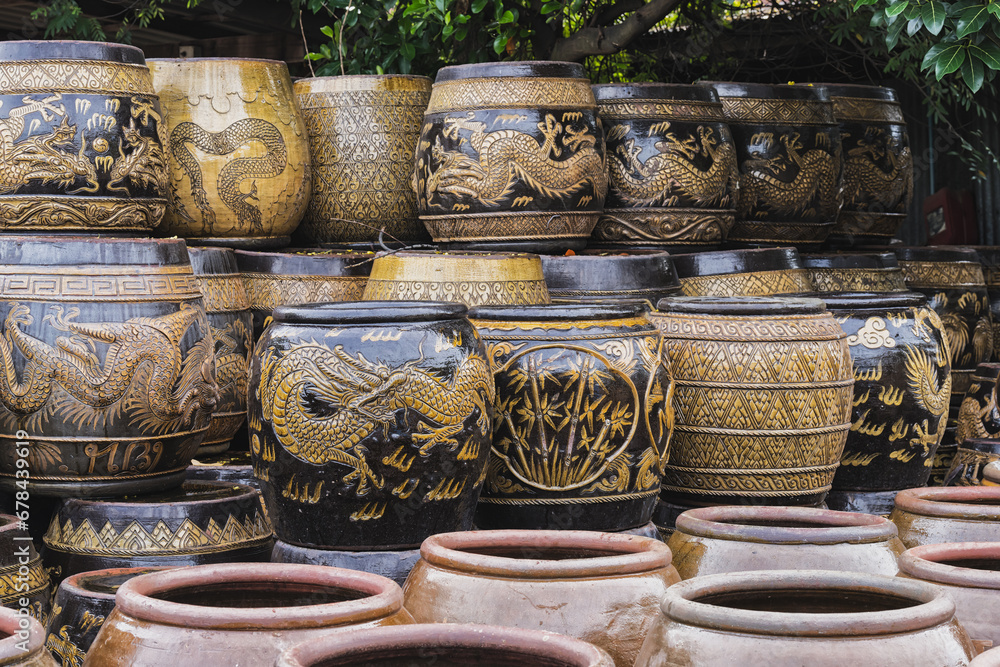 Fototapeta premium Hand-painted Thai-style dragon jars from Ratchaburi, Thailand