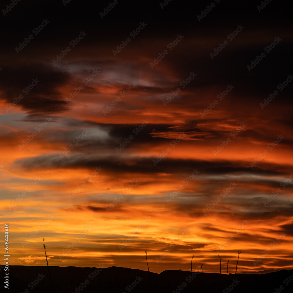 Yellow Orange and Purple Clouds In High Contrast Over Big Bend