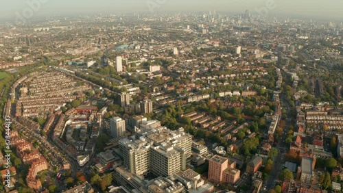 Circling aerial shot of Royal Free Hospital looking towards London skyline photo