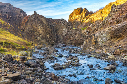 flowing river and landscape in the mountains -- Husafell Canyon, Iceland