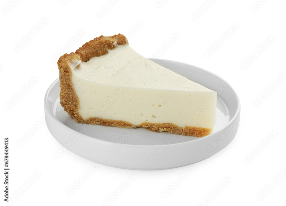 Piece of tasty vegan tofu cheesecake isolated on white Piece of tasty vegan tofu cheesecake isolated on white