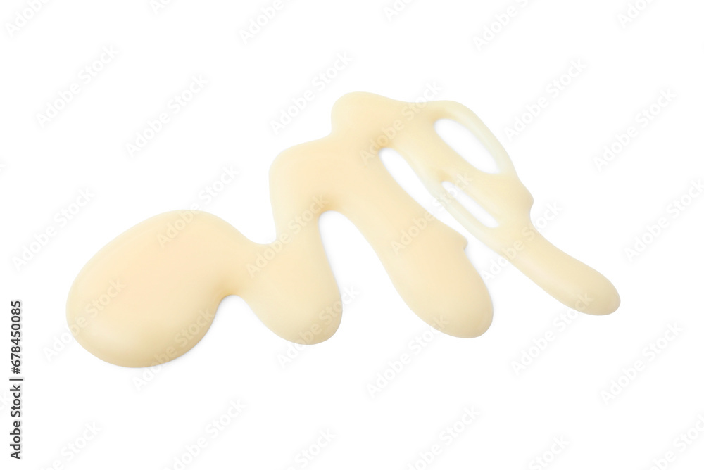 Spilled tasty condensed milk isolated on white Spilled tasty condensed milk isolated on white