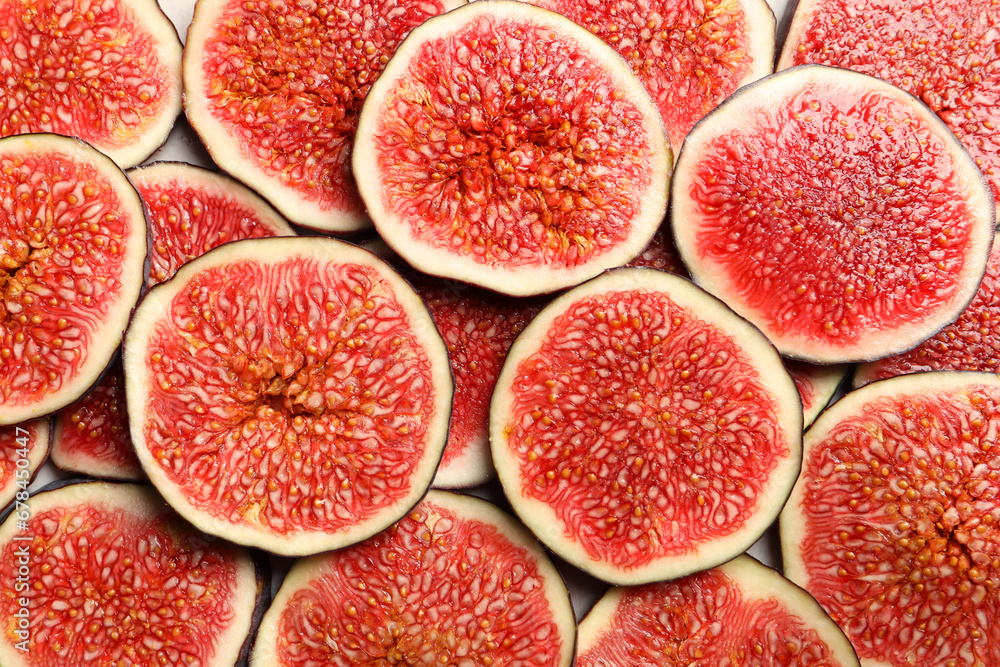 Pieces of fresh ripe figs on table, top view Pieces of fresh ripe figs on table, top view