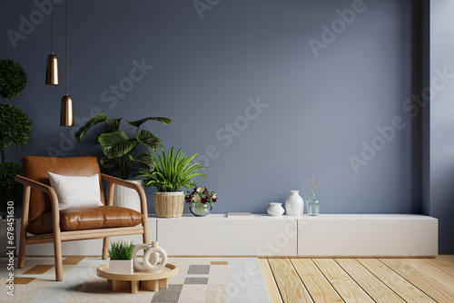 Dark blue wall style house with armchair and accessories in the room