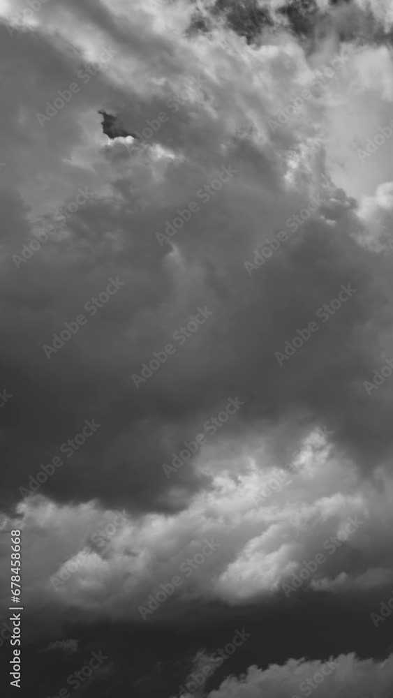 Dramatic dark storm clouds are moving fast, timelapse. Vertical video Dramatic dark storm clouds are moving fast, timelapse. Vertical video