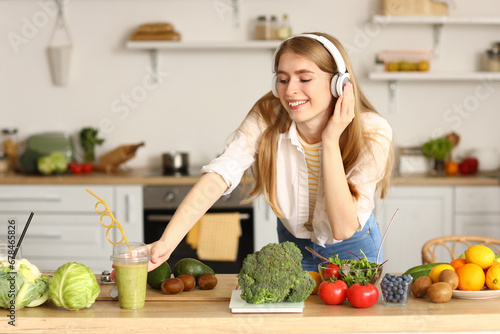 Young woman with headphones...