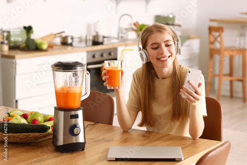 Young woman with headphones...