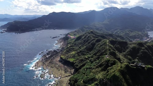 Aerial 4k footage of Bitoujiao, a famous scenery of Taiwan northeast corner. Birds eye view in Bitoujiao cape, Ruifang district, New Taipei, Taiwan. photo