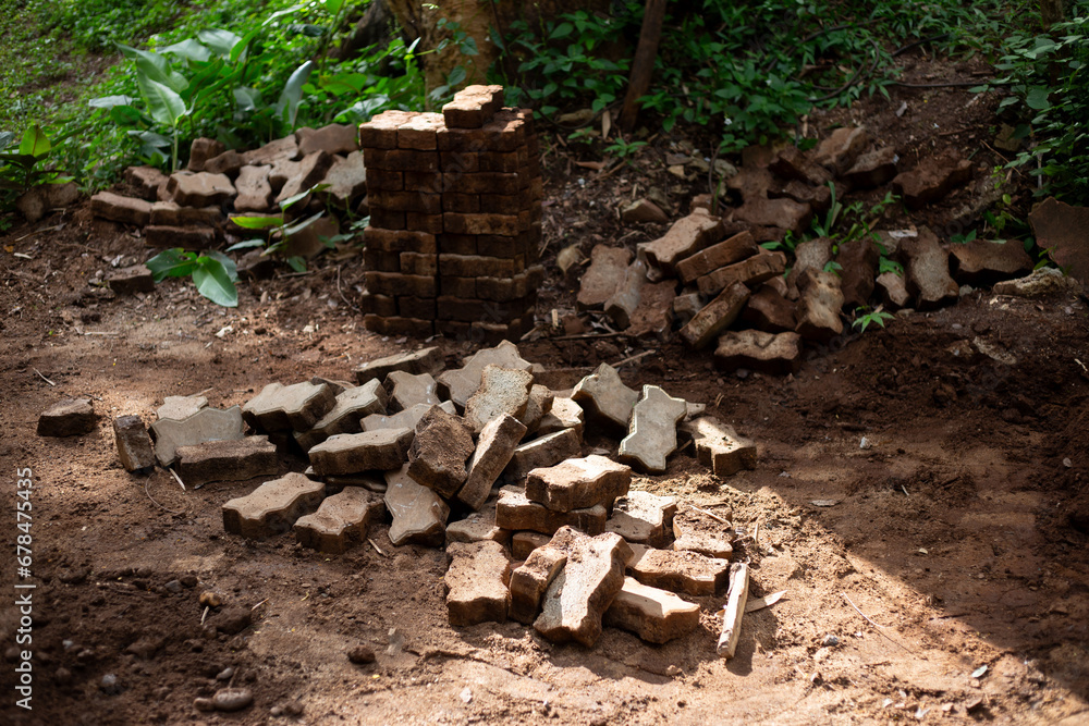 selective focus brick block worm piled on the ground The area is being adjusted to be even. selective focus brick block worm piled on the ground The area is being adjusted to be even.