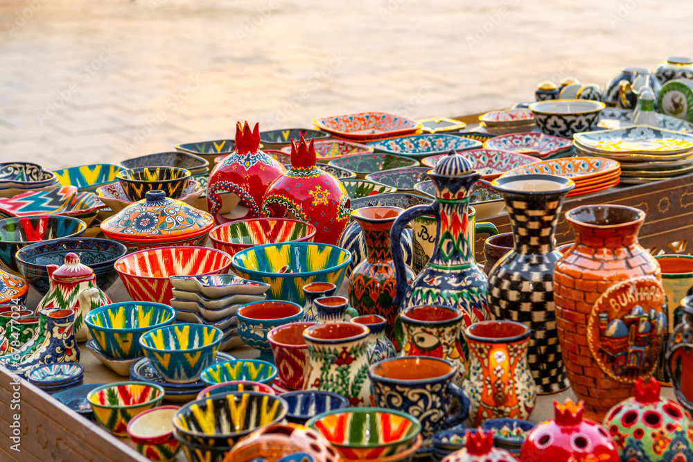 Plates and pots on a street market in the city of Bukhara, Uzbekistan