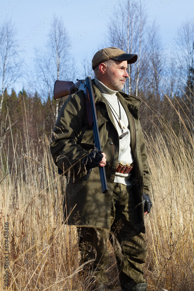the hunter walks in the tall withered grass the hunter walks in the tall withered grass