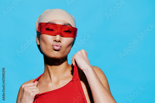 Woman asian blue fashion emotion caucasian sunglasses summer trendy red smiling beauty portrait