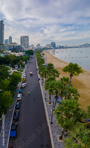 Pattaya Thailand, a view of the beach road with hotels and skyscrapers buildings alongside the renovated new beach road. Pattaya beach road on a sunny day