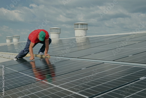 Obraz na płótnie Solar panel array on on a warehouse roof w salonie