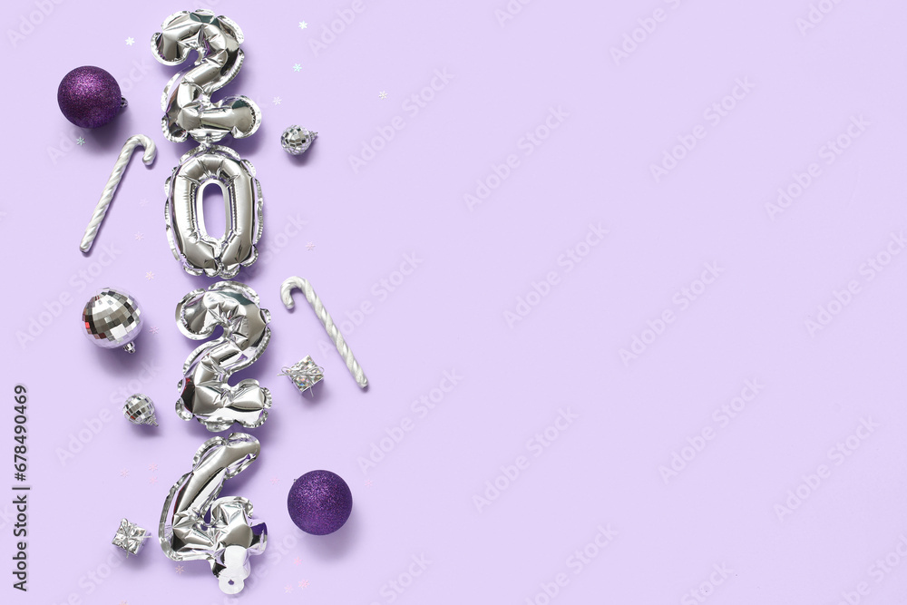 Fototapeta premium Composition with figure 2024 made of foil balloons and Christmas decorations on lilac background