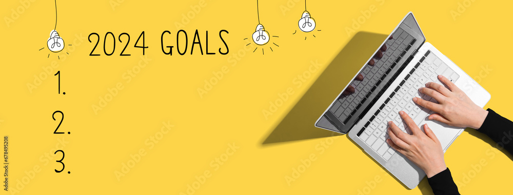 2024 goals with person using a laptop computer - obrazy, fototapety, plakaty 