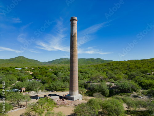 Aerial drone view of the old “La Ramona” chimney in El Triunfo, Baja California Sur, Mexico