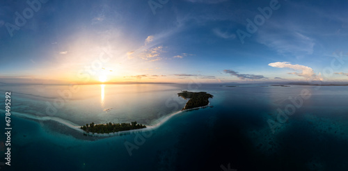 defaultDodola Island, one of the most beautiful places to go in Morotai, one of the island on North Maluku, Indonesia. Dodola island is divided into 2 island and it will connected the the sea tide is  photo