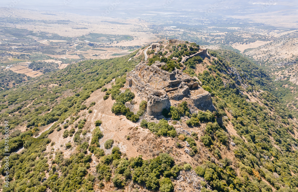 Obraz premium Drone view of the remains of the all medieval fortress of Nimrod - Qalaat al-Subeiba, located near the border with Syria and Lebanon on the Golan Heights, in northern Israel