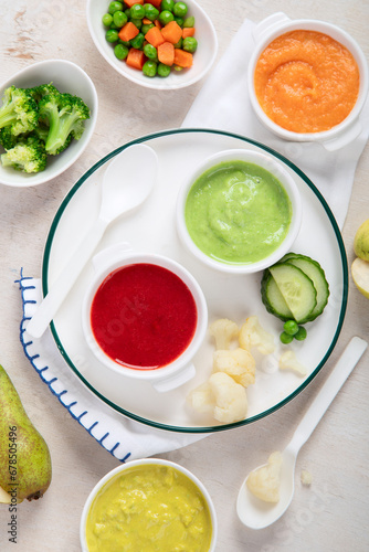Baby food. Colorful vegetable and fruit puree.