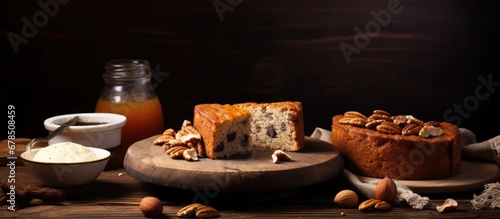 Nut cake and ingredients on wooden table