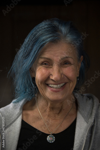 Radiant Senior Woman portrait with Blue Dyed Hair